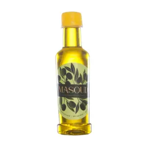 بطری شیشه‌ای روغن درمانی زیتون خالص مسعود با درب زرد و لیبل زیتون مسعود مناسب مصارف درمانی و ماساژ